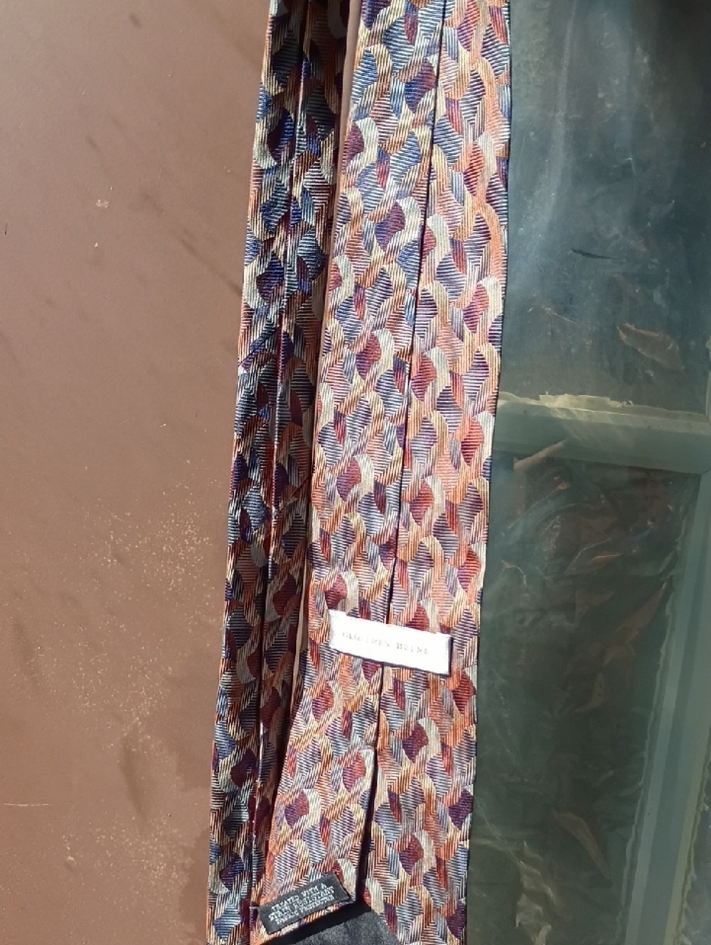Geoffrey Beene Silk Tie in Blue, Burgundy & Tan Geometric